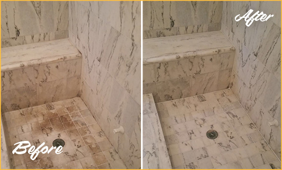Before and After Picture of a Dirty New Carlisle Marble Shower Cleaned to Eliminate Dark Stains