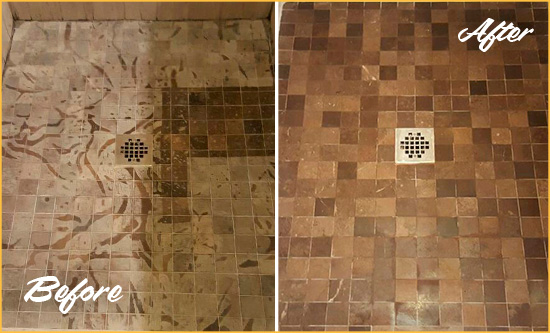 Before and After Picture of a Stained New Carlisle Marble Shower Floor Cleaned to Remove Etching