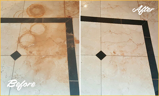 Before and After Picture of a New Carlisle Marble Floor Cleaned to Eliminate Rust Stains